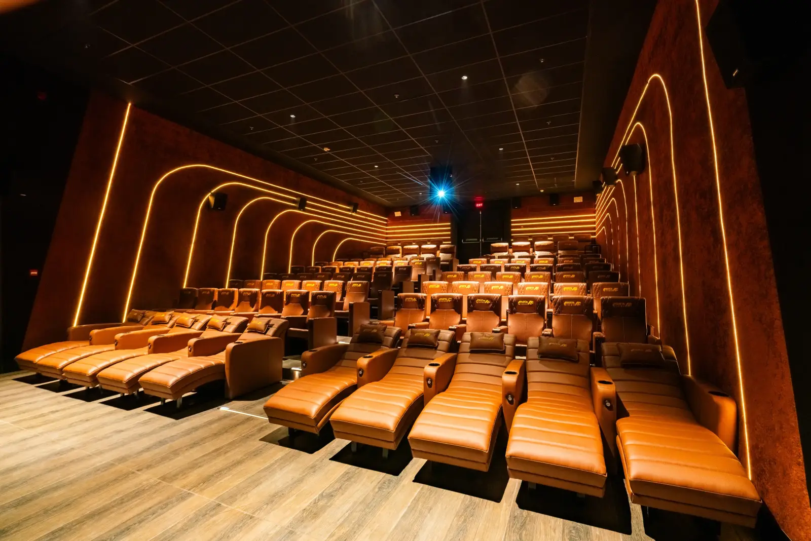 Luxury recliner auditorium with warm lighting